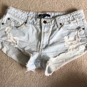 Light wash ripped shorts
